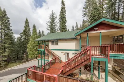 a house with a staircase leading up to it at Lower Cascades in Yosemite West