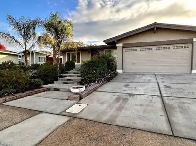 a house with a driveway with a garage at Sunrise View in Rocklin