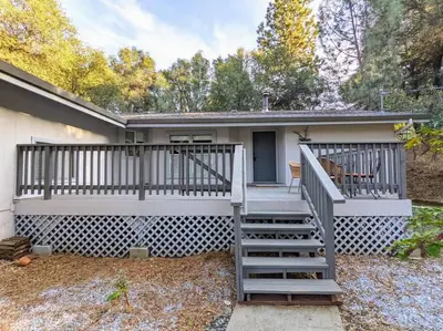a home with a staircase leading to a house at Home in Groveland near Yosemite NP in Groveland