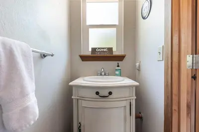 a bathroom with a sink and a mirror at Carnelian Bay 4BD Near Beach & Slopes in Carnelian Bay