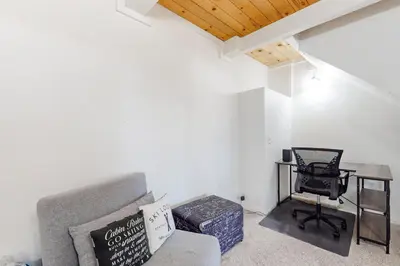 a living room with a couch and a chair at Tahoe Heavenly Hideaway in Stateline