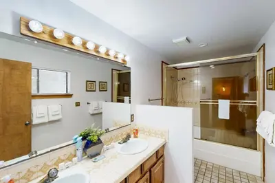 a bathroom with a sink and a shower at Scenes of Evergreens in Incline Village