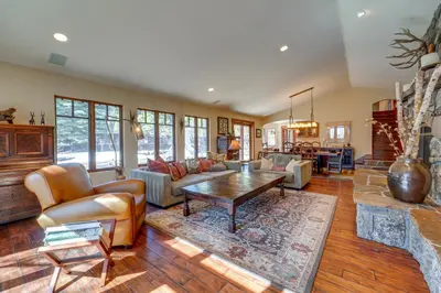 a living room with a couch and a table at Private Patio and Gas Grill Stunning Truckee Home in Truckee