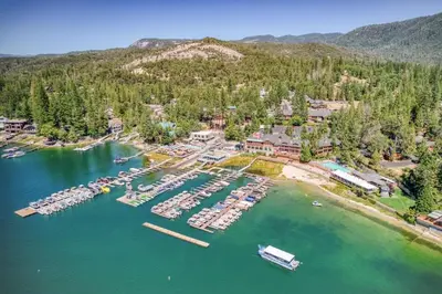 an aerial view of a resort with a marina at #4 Cottage Like Suite with Private Hot Tub in Bass Lake