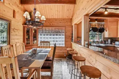 a kitchen with a table and chairs and a bar at Incline Village Getaway in Incline Village