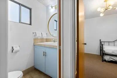 a bathroom with a sink and a toilet at Towering Pines Lakefront - 3 BR w Hot Tub & Buoy in Tahoe City