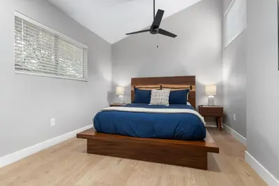 a bedroom with a bed and a ceiling fan at The General Sherman Cabin in Three Rivers