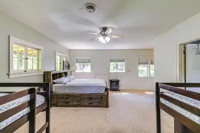 a bedroom with two beds and a ceiling fan at On-Site River Access Quiet Home in Wilseyville! in Wilseyville