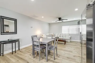a dining room with a table and chairs and a couch at Pet-Friendly Hughson Getaway, 9 Mi to Modesto! in Hughson