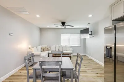 a kitchen and dining room with a table and chairs at Pet-Friendly Hughson Getaway, 9 Mi to Modesto! in Hughson