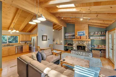 a living room with a couch and a fireplace at 3BR with Hot Tub 1 Mile to Diamond Peak in Incline Village