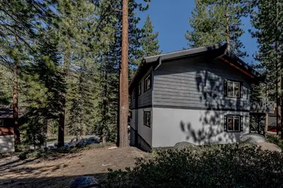 a small black and white house in the woods at 3BR with Hot Tub 1 Mile to Diamond Peak in Incline Village