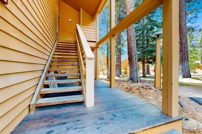 a staircase on the side of a house with trees at McCloud 176 in Incline Village