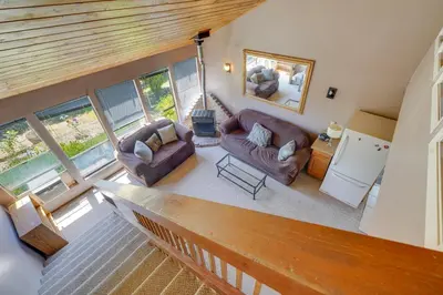 an overhead view of a living room with couches at Auburn Cottage with Patios and Garden - 3 Mi to Town! in Auburn