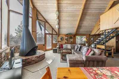 a living room with a fireplace in a house at 4BR Tahoe Retreat in Prime Location in Tahoe City