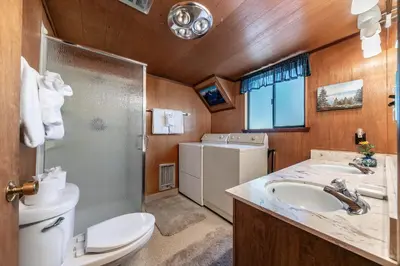 a bathroom with a toilet and a sink and a shower at 4BR Tahoe Retreat in Prime Location in Tahoe City