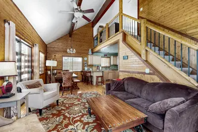 a living room with a couch and a table at Forest View in Soda Springs