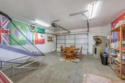 a room with a table and a ping pong racket at Family-Friendly Clovis Home with Gas Grill and Patio! in Clovis
