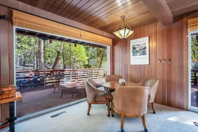 a dining room with a table and chairs at River's Edge w/ BBQ, Wifi, Firepit in North Wawona