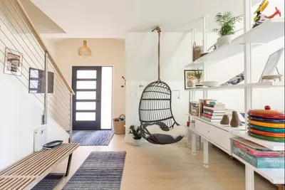 a room with a hammock hanging from the ceiling at Brand New Modern A-Frame In Kings Beach Two Blocks From The Beach in Kings Beach