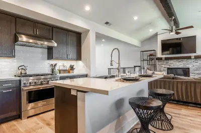 a kitchen with a large island in the middle at Creekhouse 1353 in Mammoth Lakes