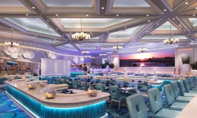 a large dining room with tables and chairs at Peppermill Resort Spa Casino in Reno