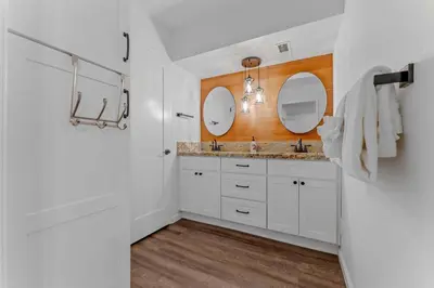 a bathroom with a sink and two mirrors at Modern 3BR Carnelian Bay Retreat in Carnelian Bay