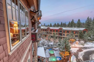 an aerial view of a resort in the snow at Catamount Lodge 409 by East West Hospitality in Truckee