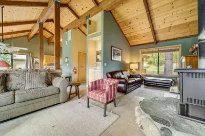 a living room with a couch and a fireplace at Close to Ski Slopes Tahoe Ski Chalet with Fireplace in Tahoe City