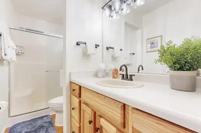a bathroom with a sink and a shower and a toilet at Kingswood Village #167 in Kings Beach