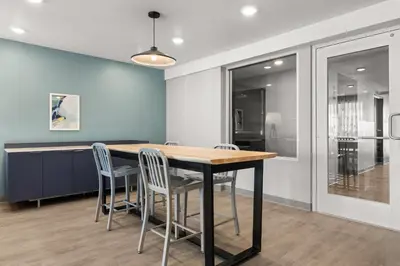 a dining room with a table and chairs at WoodSpring Suites Ceres - Modesto in Ceres