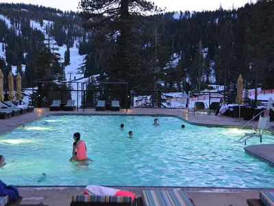 a group of people in a swimming pool at Penthouse Residence The Ritz-Carlton Lake Tahoe in Truckee