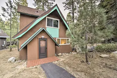 a small house with a blue roof at Tahoe Time Cabin in Incline Village