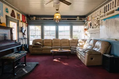 a living room with a couch and a table at The Hostel California in Bishop