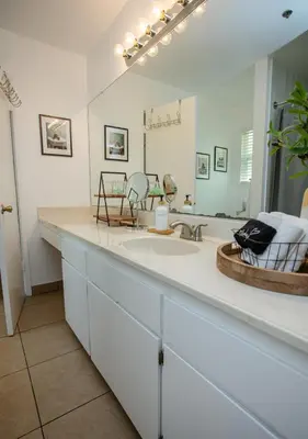a bathroom with a sink and a large mirror at Comfort meets Tranquility by the Sequoia Entrance in Three Rivers
