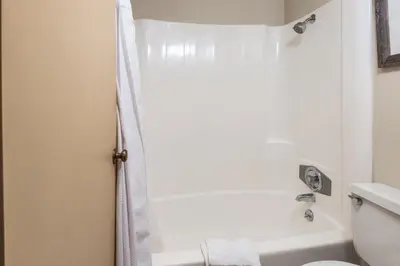 a bathroom with a shower and a toilet and a sink at Updated 2 Bedroom 2 Bathrooms 1849 Condos #109 Steps to Canyon Lodge Sleeps 6 in Mammoth Lakes