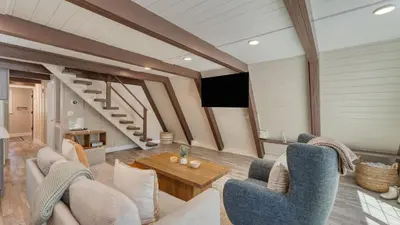 a living room with a couch and a table at Speckled by AvantStay Modern Interior 0.5mi to Lake in Kings Beach
