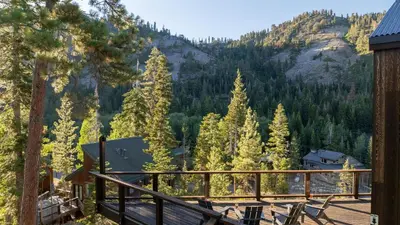 a view from the deck of a house with a mountain at Trapper by AvantStay A Interior Design w Sauna in Alpine Meadows