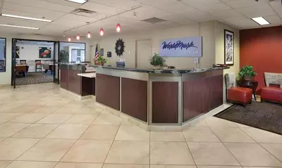 a lobby of a waiting room with a counter and chairs at Enjoy all Reno has to offer in this 2BD resort condo with outdoor pool or hot tub in Reno