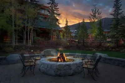 a fire pit in a yard with chairs around it at Marriott Grand Residences Luxury 1BD in South Lake Tahoe
