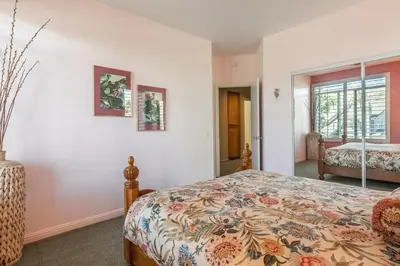 a bedroom with a bed and a window at Snowcreek IV 525 in Mammoth Lakes