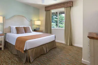 a hotel room with a large bed and a window at Wyndham South Shore 1Bd- sleeps 4 in Zephyr Cove