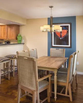 a dining room with a wooden table and chairs at Worldmark South Shore 1Bd- sleeps 4 in Zephyr Cove