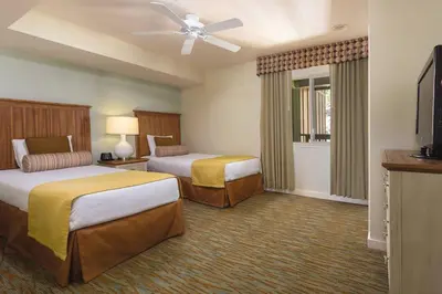 a hotel room with two beds and a flat screen tv at Worldmark South Shore 2bd- sleeps 6 in Zephyr Cove