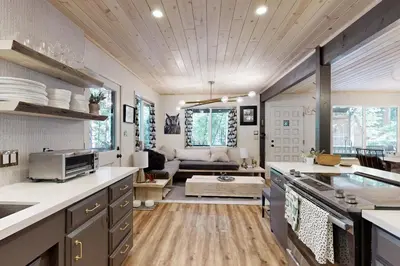 a kitchen and living room with a couch at 3 Mi to State Park Quiet Escape with Deck in Arnold in Dorrington