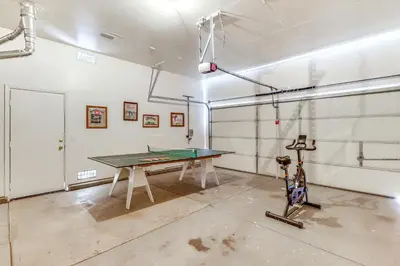 a room with a ping pong table in it at Game Room and Fireplace Reno Home 5 Mi to Dtwn! in Reno