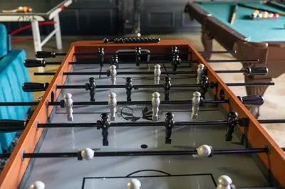 a group of cue balls on a table at Pool-GameRoom-HomeTheater-Bar-PlayStructure-FirePit in Oakhurst