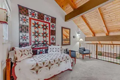 a bedroom with a bed and a balcony at Carnelian Bay 3BR + Loft Near Beach & Trails in Carnelian Bay