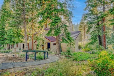 a house with a picnic table in the yard at Carnelian Bay 3BR + Loft Near Beach & Trails in Carnelian Bay