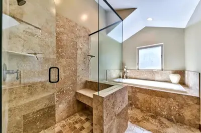 a bathroom with a glass shower and a tub at Lv12 luxury villa with hot tub, close to skiing in Glenbrook